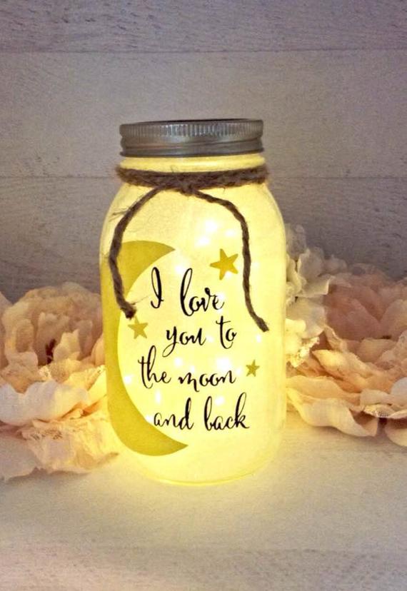 lit up jar with writing on it