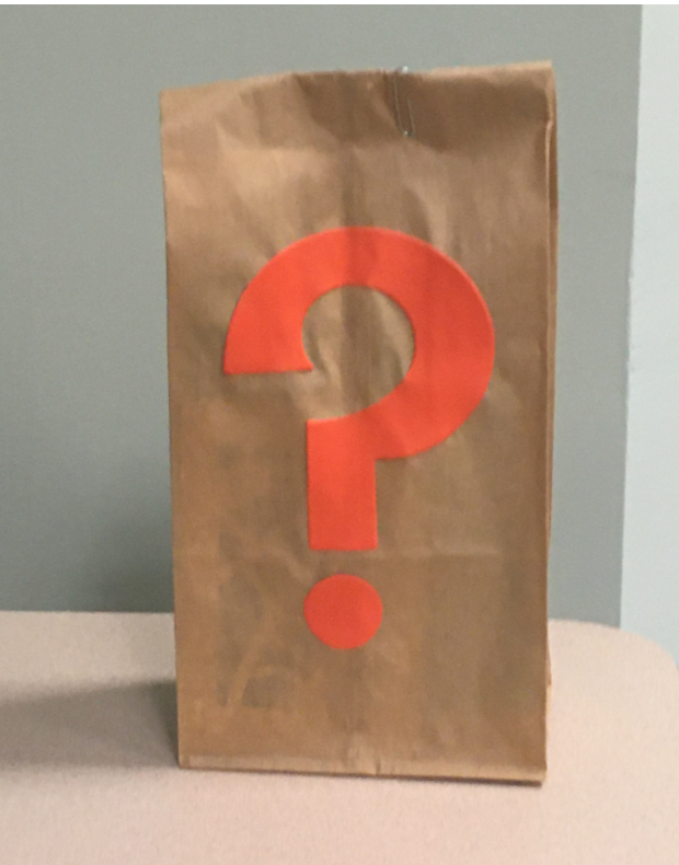 Paper bag with question mark