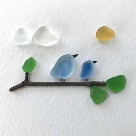Sea glass birds, leaves, sun and clouds.