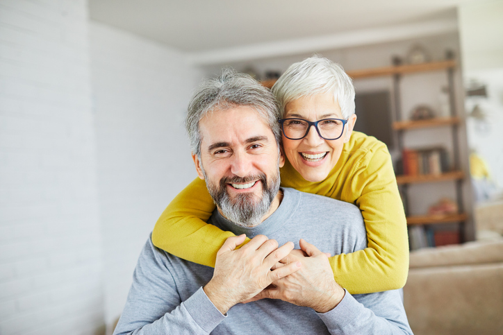 Two people smiling 