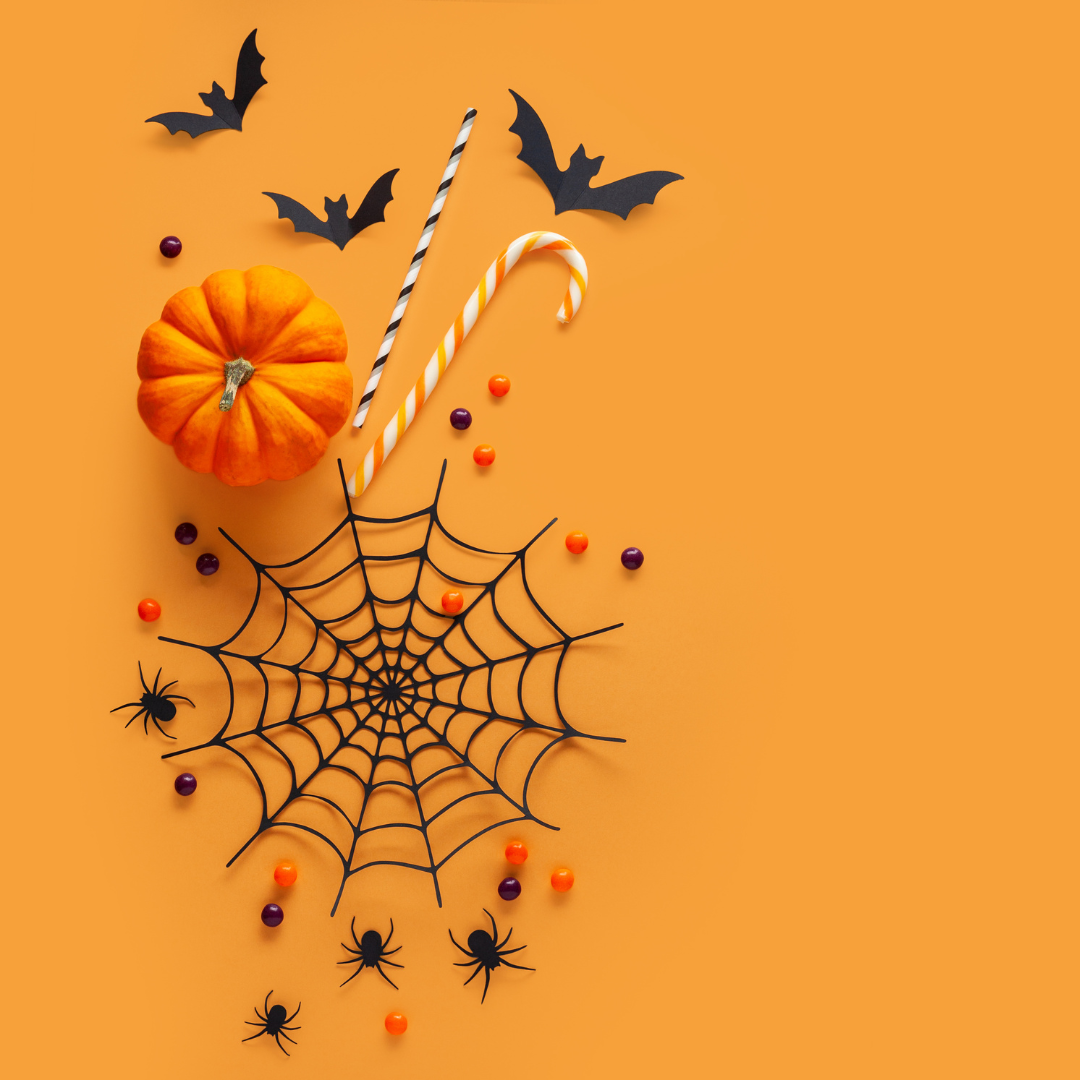 Orange background with decorative bats, pumpkins, spider web and candy