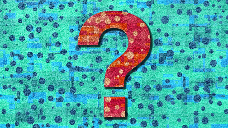 a question mark in red against a teal background