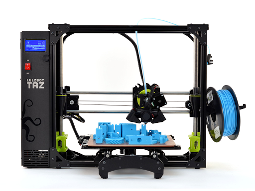 A 3D printer that is using light blue filament to make a project. It is a TAZ bot.
