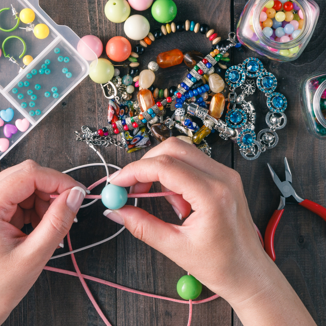 Person making jewelry