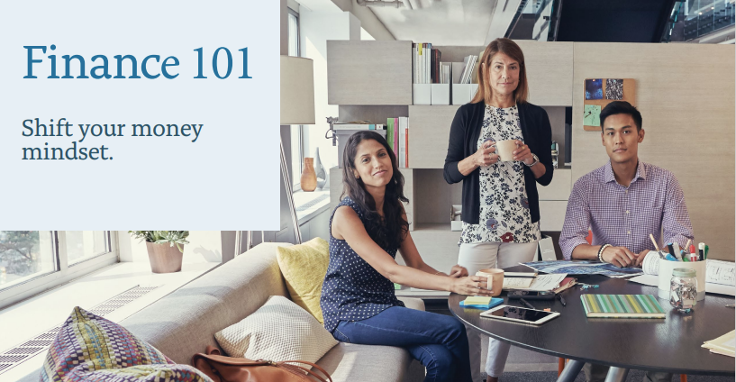 an image of three people, one sitting on a couch at a round black table with papers and devices, the second person is standing with a mug in their hands, the third person is sitting facing the camera from behind the table. the setting seems to be a modern office. on the top left there is a blocked off light blue square that says Finance 101 and beneath that shift your money mindset. 