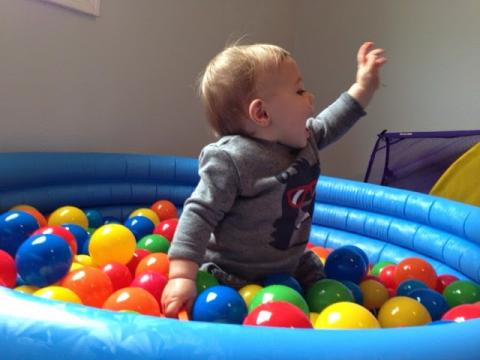child in kiddie pool